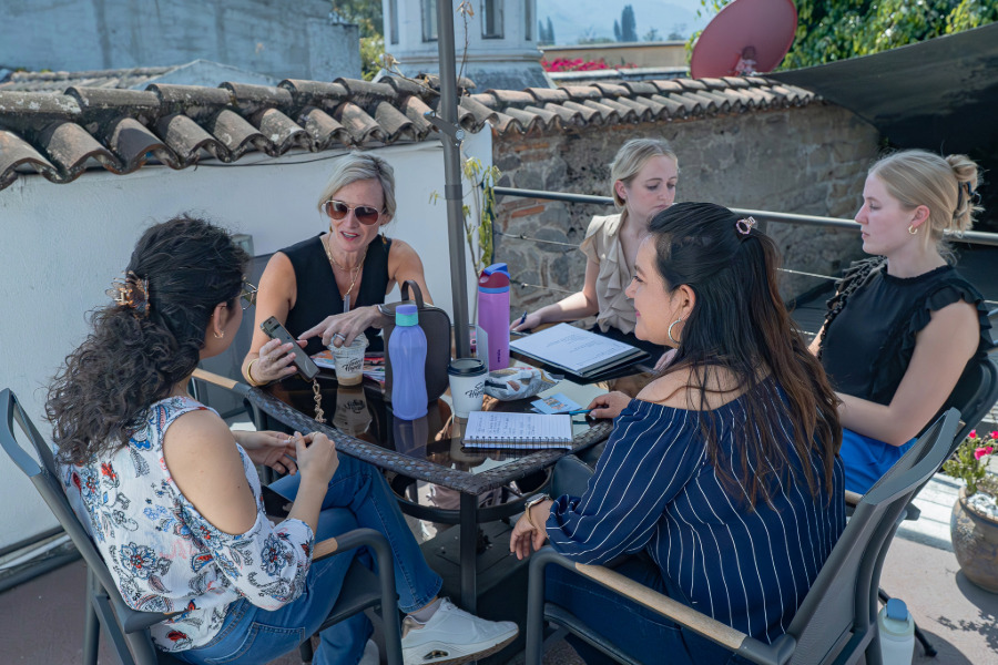 Students on a Baylor mission trip meeting with local business owners in Guatemala