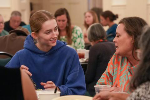 Students at a Missions Week dinner event