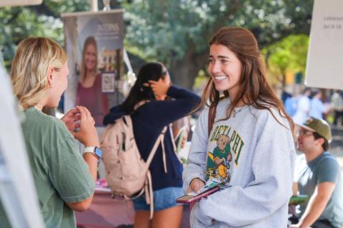 Students at a Missions Week tabling event